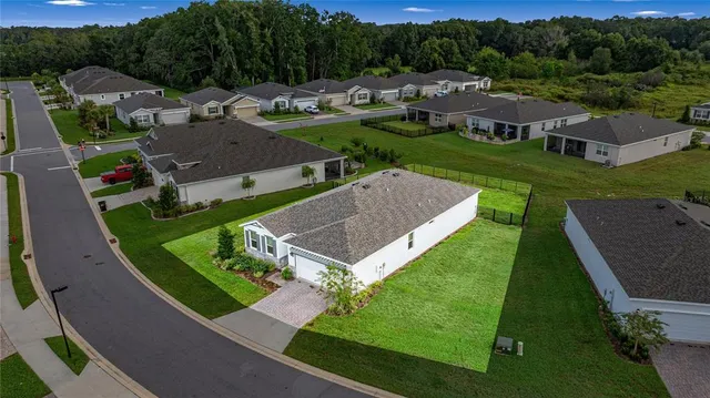 an aerial view of a house with garden