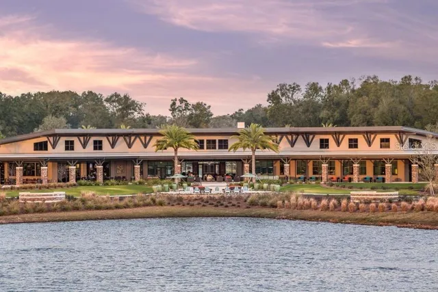a outdoor space with lots of tables and chairs