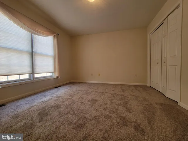 a view of a livingroom with furniture and wooden floor