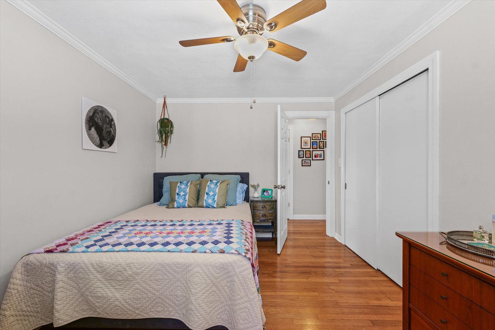 11 Normandy Place Champaign, IL 61821 - Photo 25 of 37 a bedroom with a bed and a chandelier