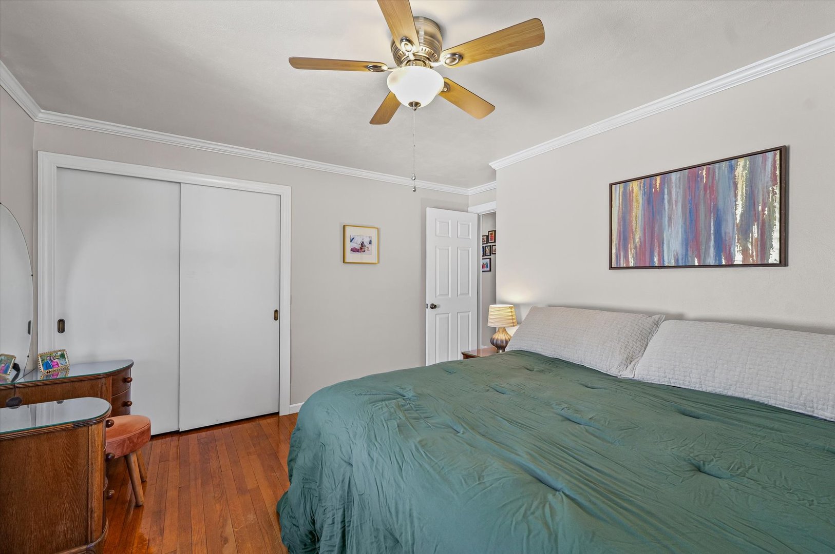 11 Normandy Place Champaign, IL 61821 - Photo 27 of 37 a bedroom with a bed and a ceiling fan