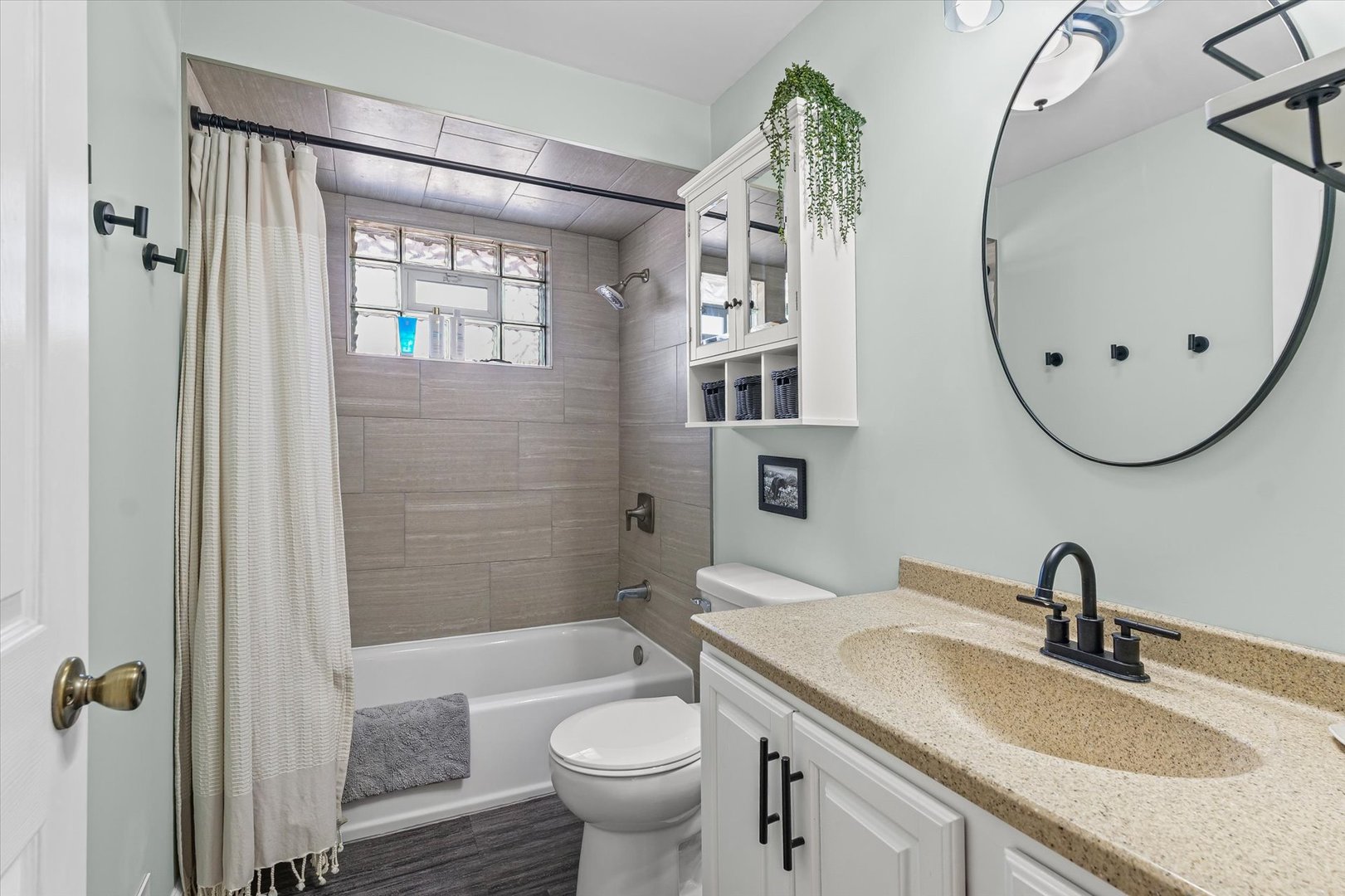 11 Normandy Place Champaign, IL 61821 - Photo 30 of 37 a bathroom with a granite countertop sink toilet and shower