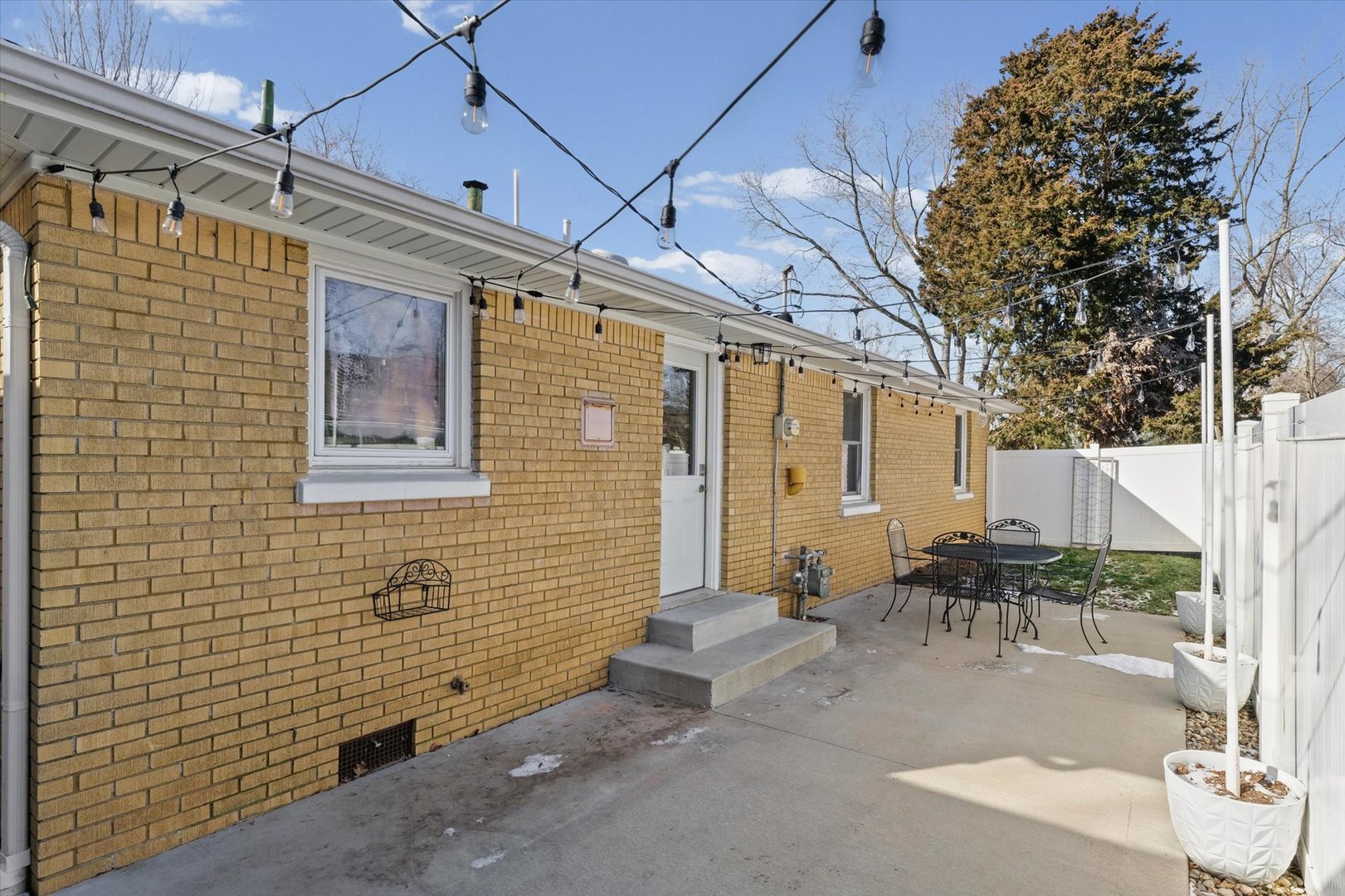 11 Normandy Place Champaign, IL 61821 - Photo 32 of 37 a backyard of a house with outdoor seating