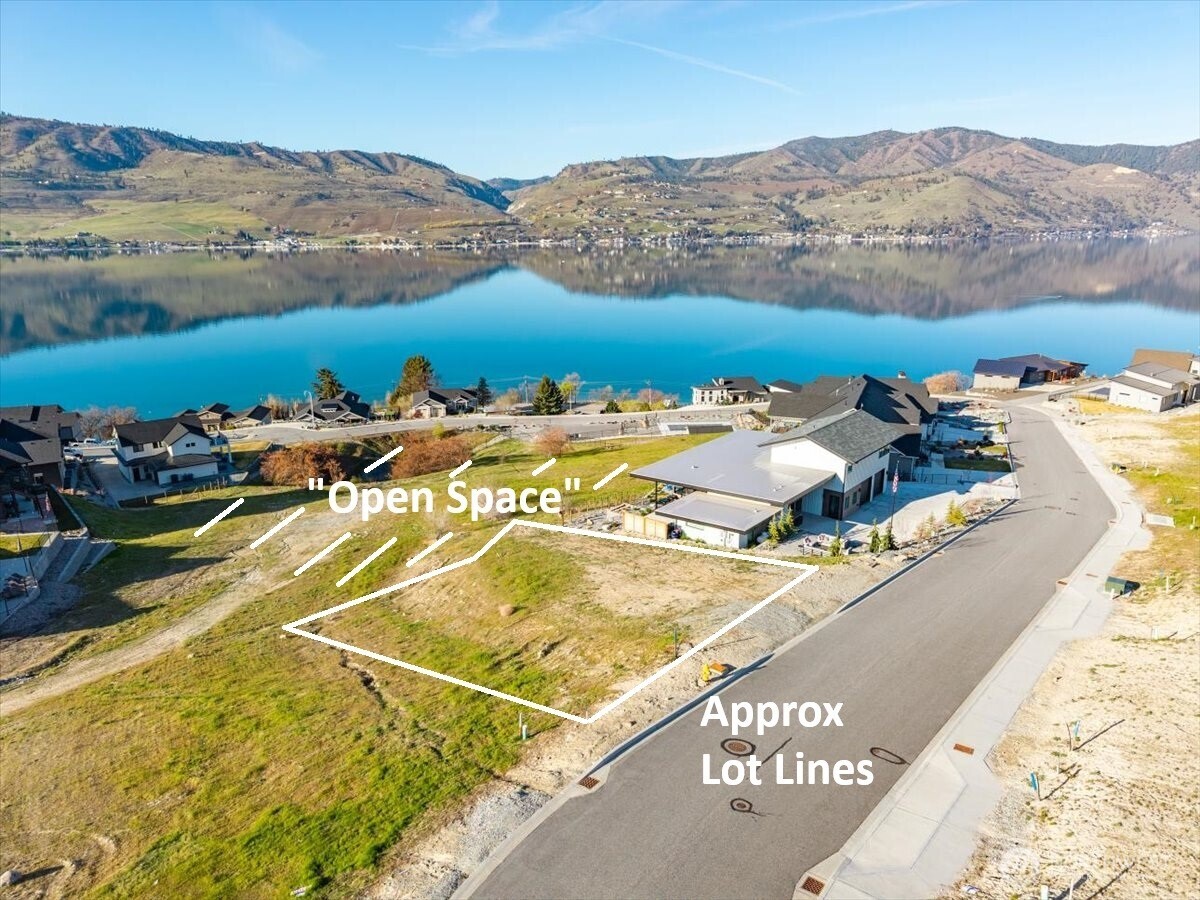 256 Apple Avenue Chelan, WA 98816 - Photo 3 of 18 a view of a swimming pool with an ocean view