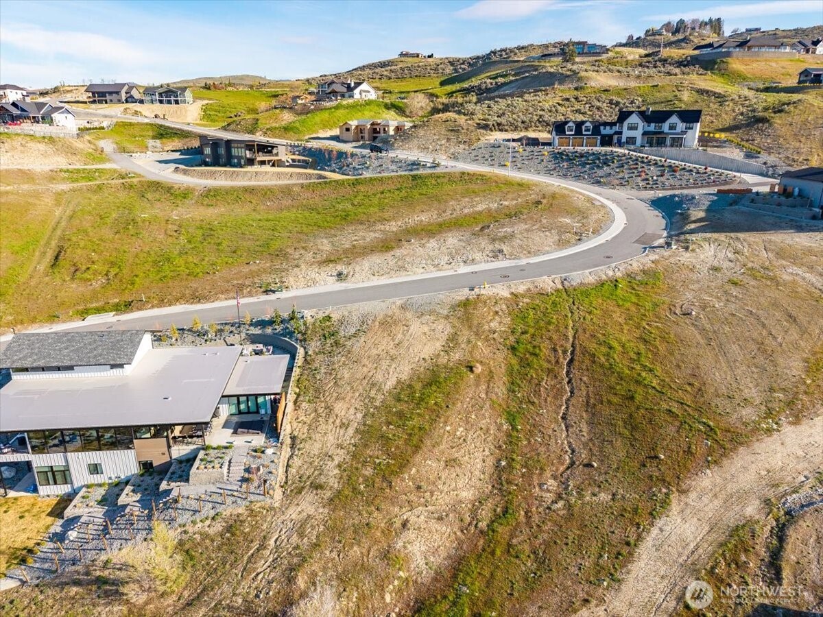 256 Apple Avenue Chelan, WA 98816 - Photo 10 of 18 a view of a swimming pool with an ocean view