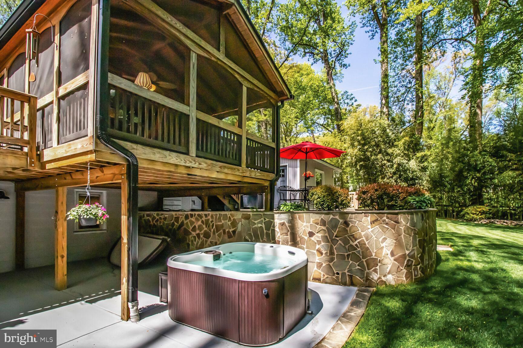 3419 Barkley Drive Fairfax, VA 22031 - Photo 37 of 57 a patio with table and chairs and potted plants
