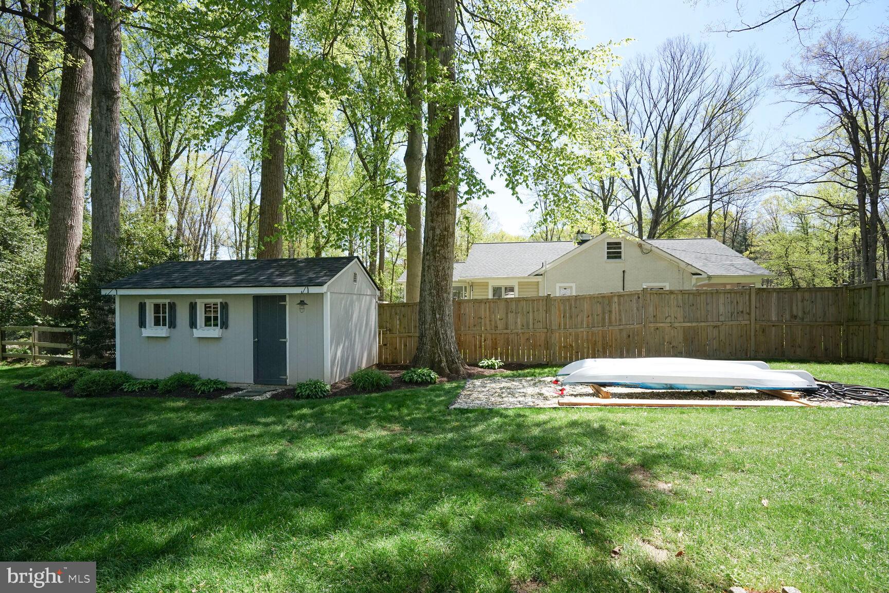 3419 Barkley Drive Fairfax, VA 22031 - Photo 44 of 57 a view of a house with backyard and trees