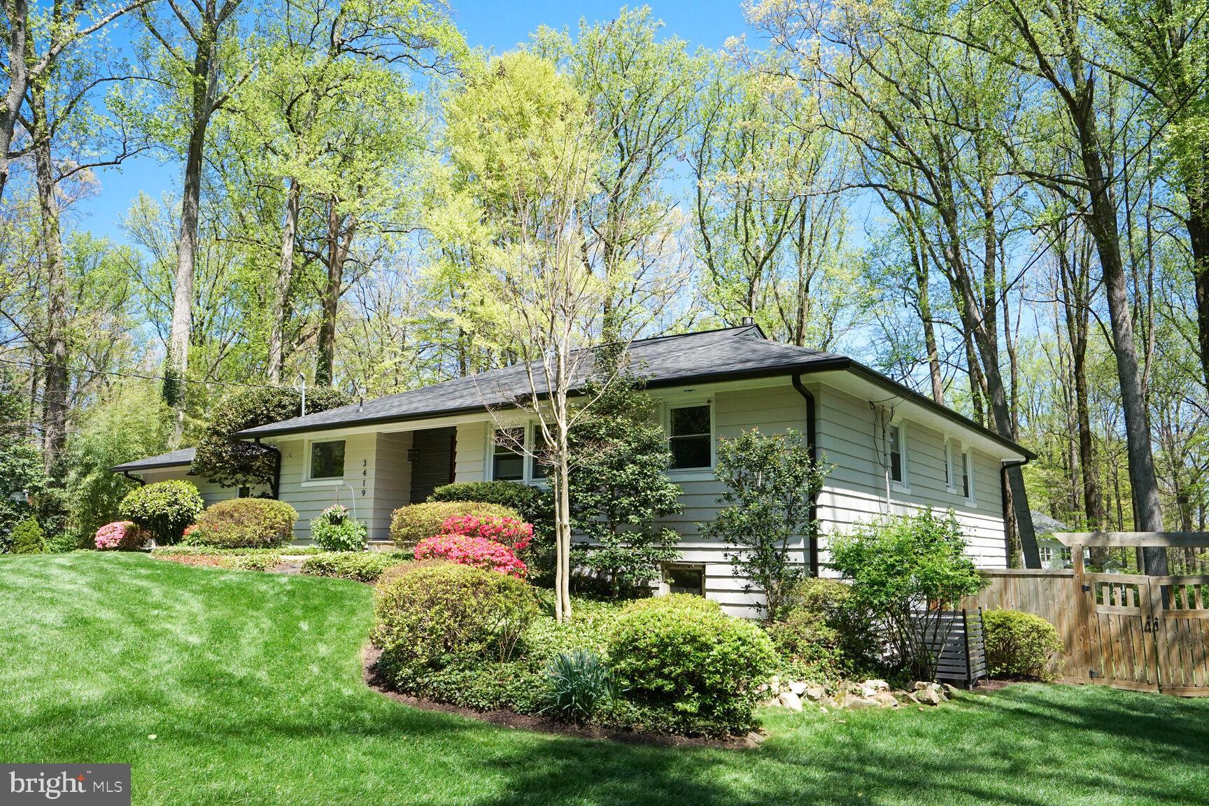 3419 Barkley Drive Fairfax, VA 22031 - Photo 5 of 57 a front view of house with yard and trees