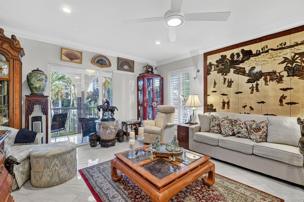 250 Northeast 20th Street, Unit 2270 Boca Raton, FL 33431 - Photo 15 of 39 a living room with furniture and wooden floor
