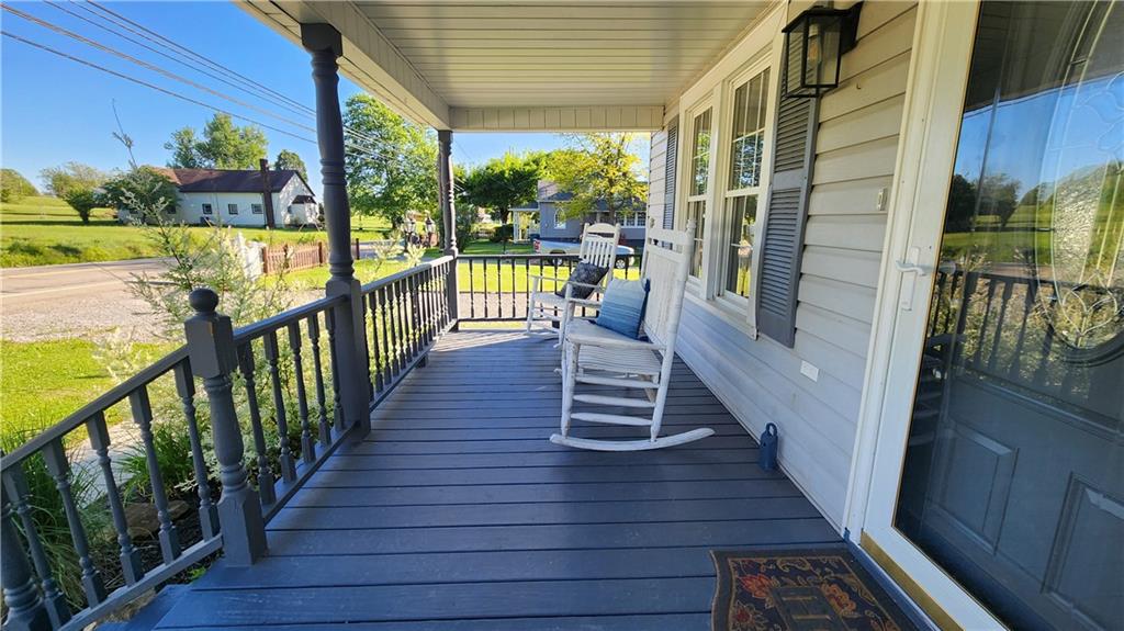 671 Old Rte 8 Harrisville, PA 16038 - Photo 6 of 49 a view of balcony with wooden floor and outdoor seating