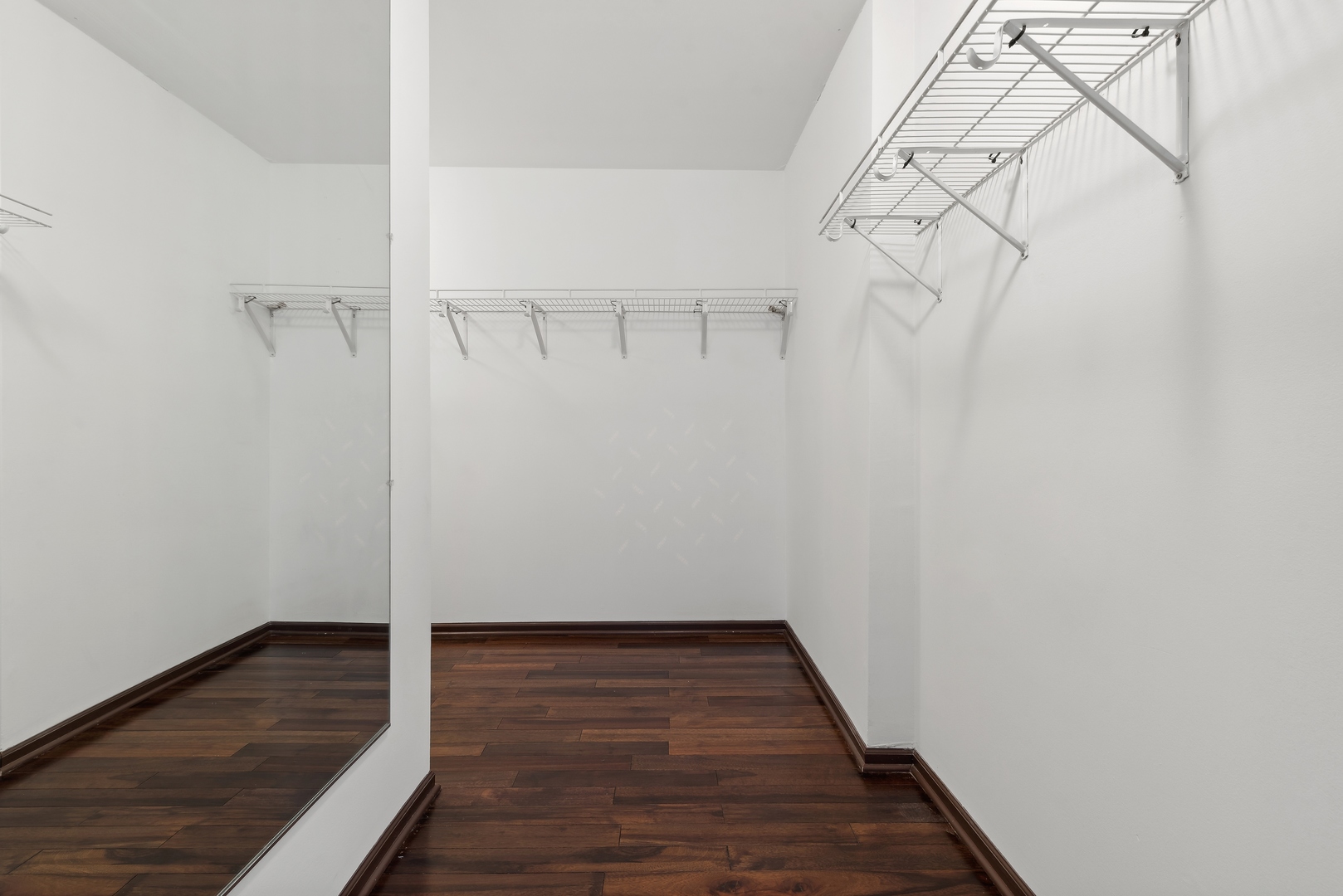 1115 South Elmhurst Road Wheeling, IL 60090 - Photo 15 of 33 a view of a room with wooden floor