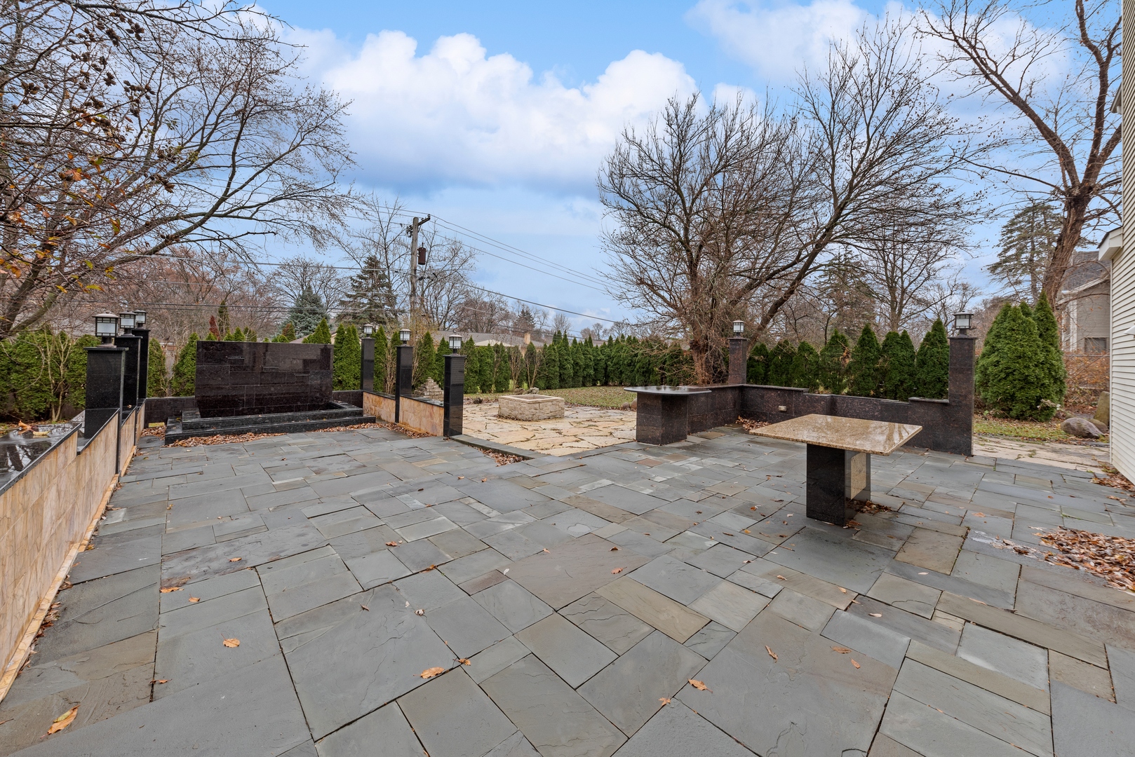 1115 South Elmhurst Road Wheeling, IL 60090 - Photo 30 of 33 a view of a bench in a backyard