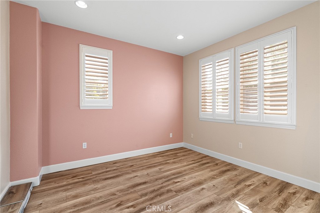 2010 Jacob Street Gridley, CA 95948 - Photo 21 of 63 a view of an empty room with wooden floor and a window