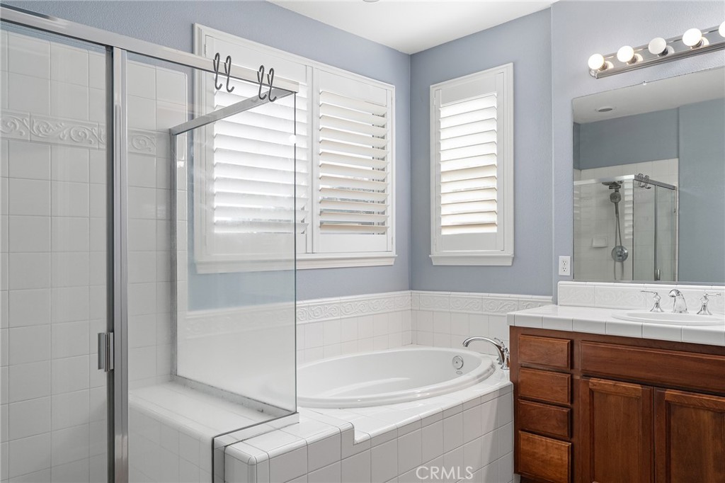 2010 Jacob Street Gridley, CA 95948 - Photo 38 of 63 a bathroom with a tub sink and mirror