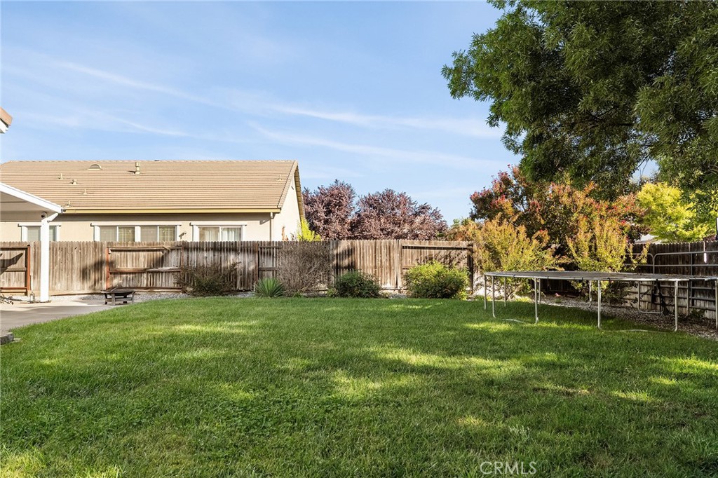 2010 Jacob Street Gridley, CA 95948 - Photo 48 of 63 a view of a house with a yard and sitting area