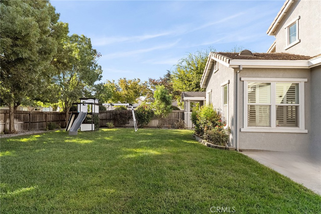 2010 Jacob Street Gridley, CA 95948 - Photo 51 of 63 a view of a house with a backyard and a patio