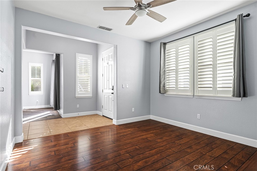 2010 Jacob Street Gridley, CA 95948 - Photo 10 of 63 a view of an empty room with wooden floor and a window