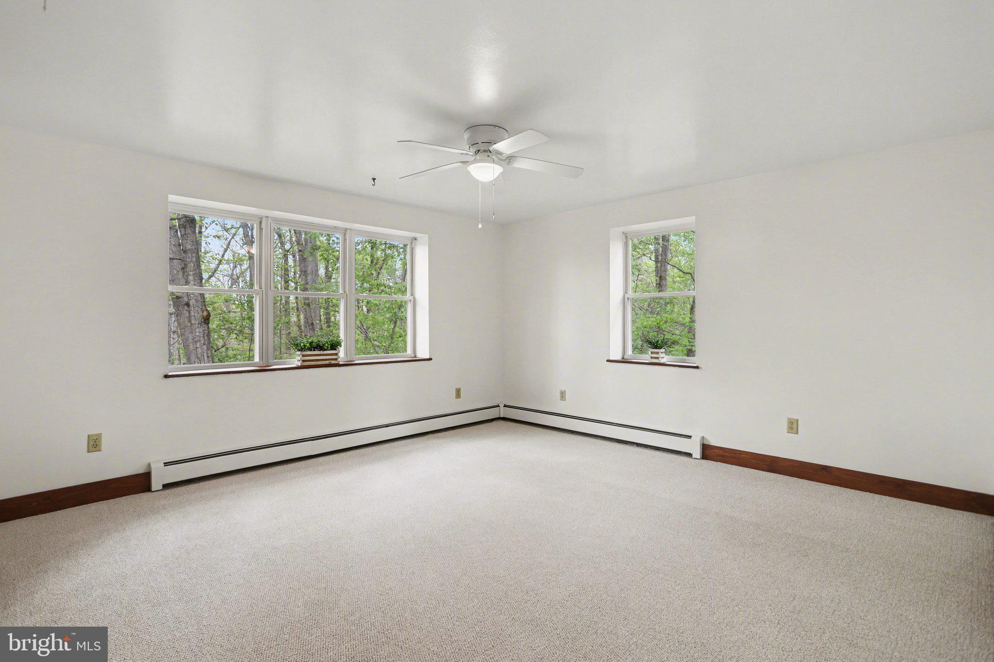 204 Bullfrog Road Gettysburg, PA 17325 - Photo 31 of 52 an empty room with windows and closet