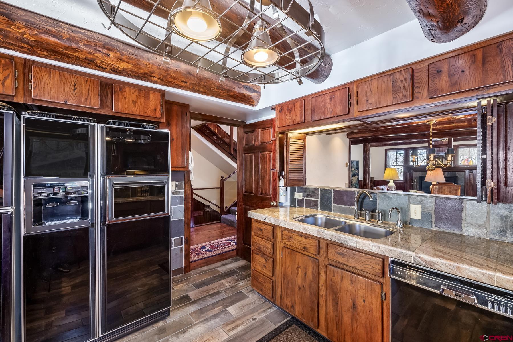 8 Gothic Avenue Crested Butte, CO 81224 - Photo 13 of 35 a kitchen with a sink and cabinets