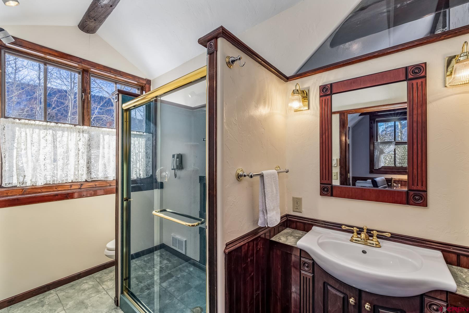 8 Gothic Avenue Crested Butte, CO 81224 - Photo 23 of 35 a bathroom with a sink and mirror