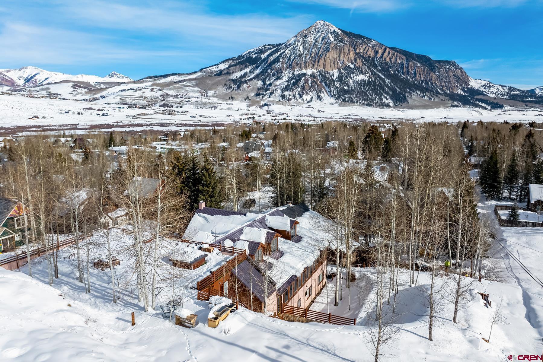 8 Gothic Avenue Crested Butte, CO 81224 - Photo 32 of 35 a view of a backyard with sitting area