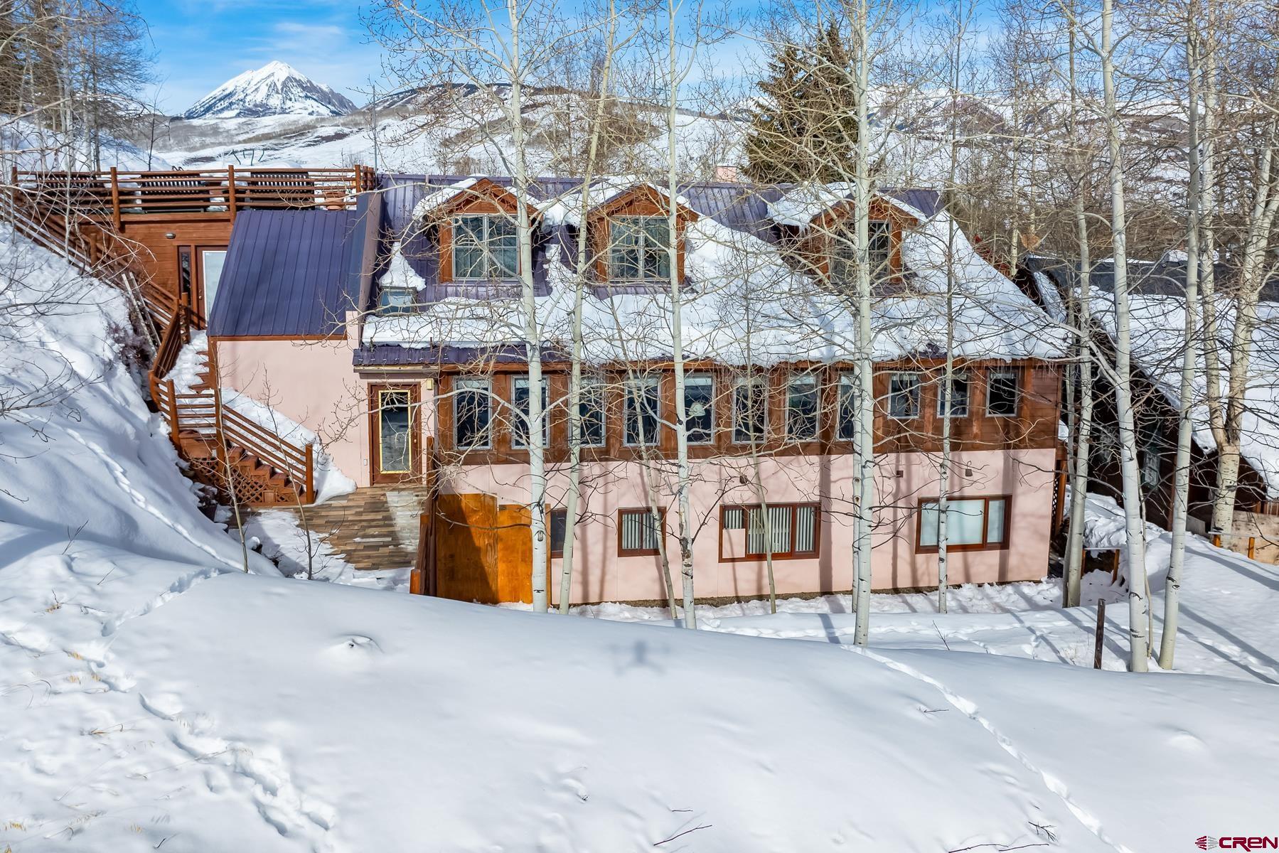 8 Gothic Avenue Crested Butte, CO 81224 - Photo 33 of 35 a view of a large building with a large tree