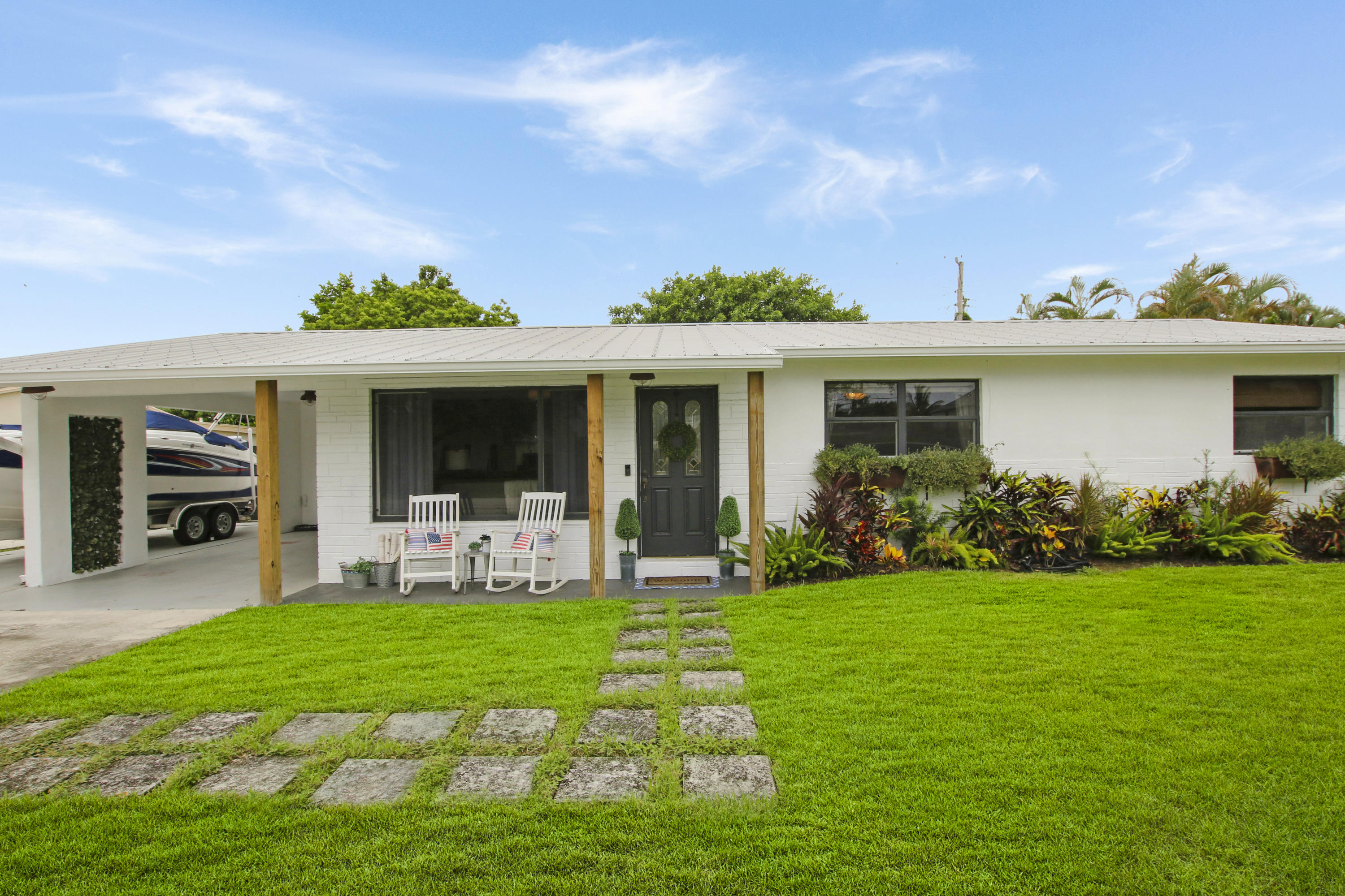 1512 Kingsley Road Jupiter, FL 33469 - Photo 1 of 38 House1-23