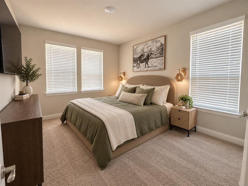 1605 Buzzard Road Denton, TX 76205 - Photo 21 of 27 Plush carpet flooring, recessed ceiling lighting, two windows with blinds, and two wall-mounted light fixtures