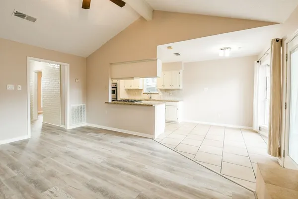 a view of a kitchen with a sink