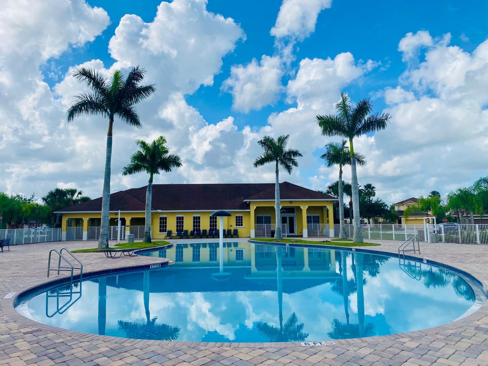 9724 Apollo Avenue Fort Pierce, FL 34945 - Photo 15 of 15 a view of a swimming pool with a fountain