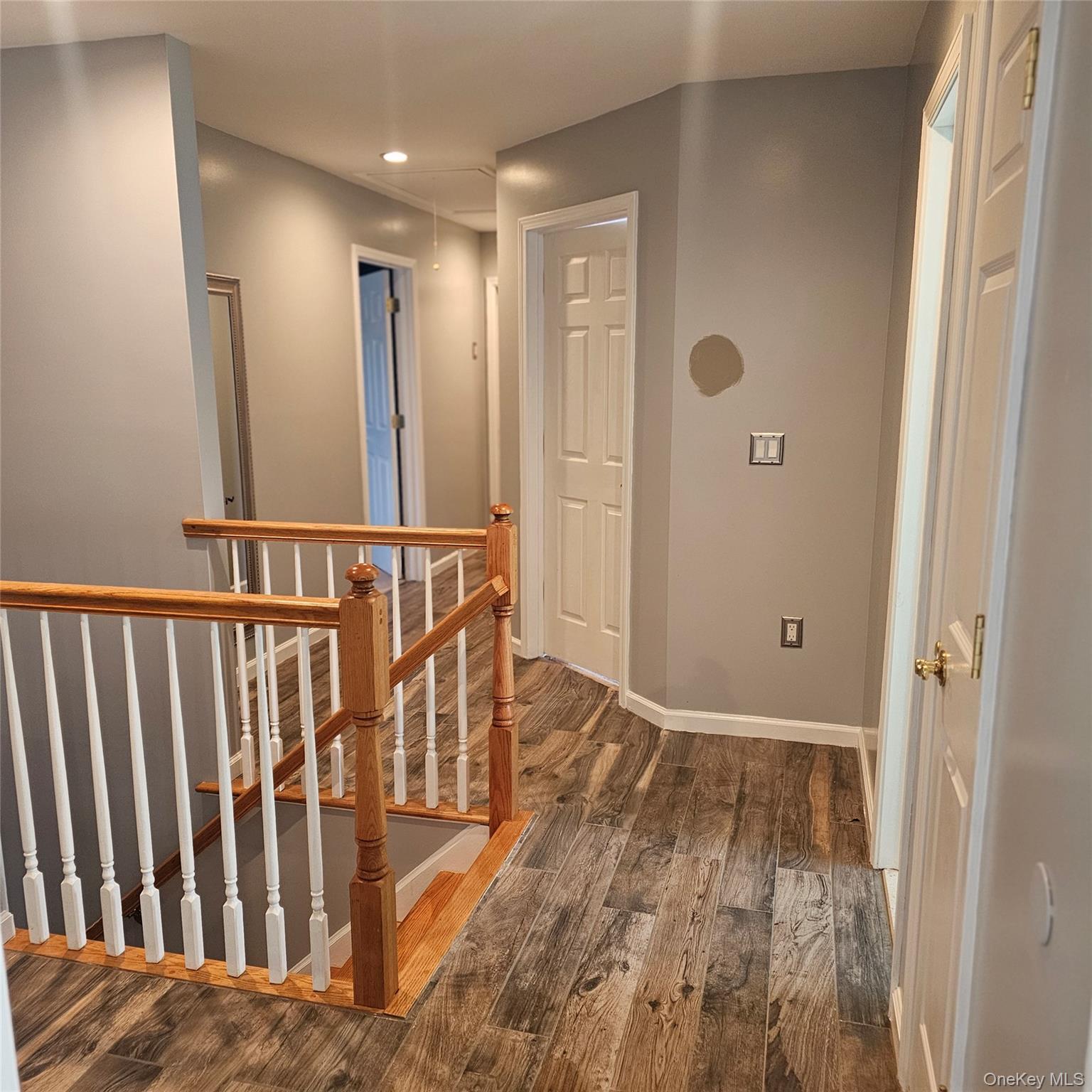 235 Maples Road Middletown, NY 10940 - Photo 26 of 34 Corridor with an upstairs landing, dark wood finished floors, and recessed lighting