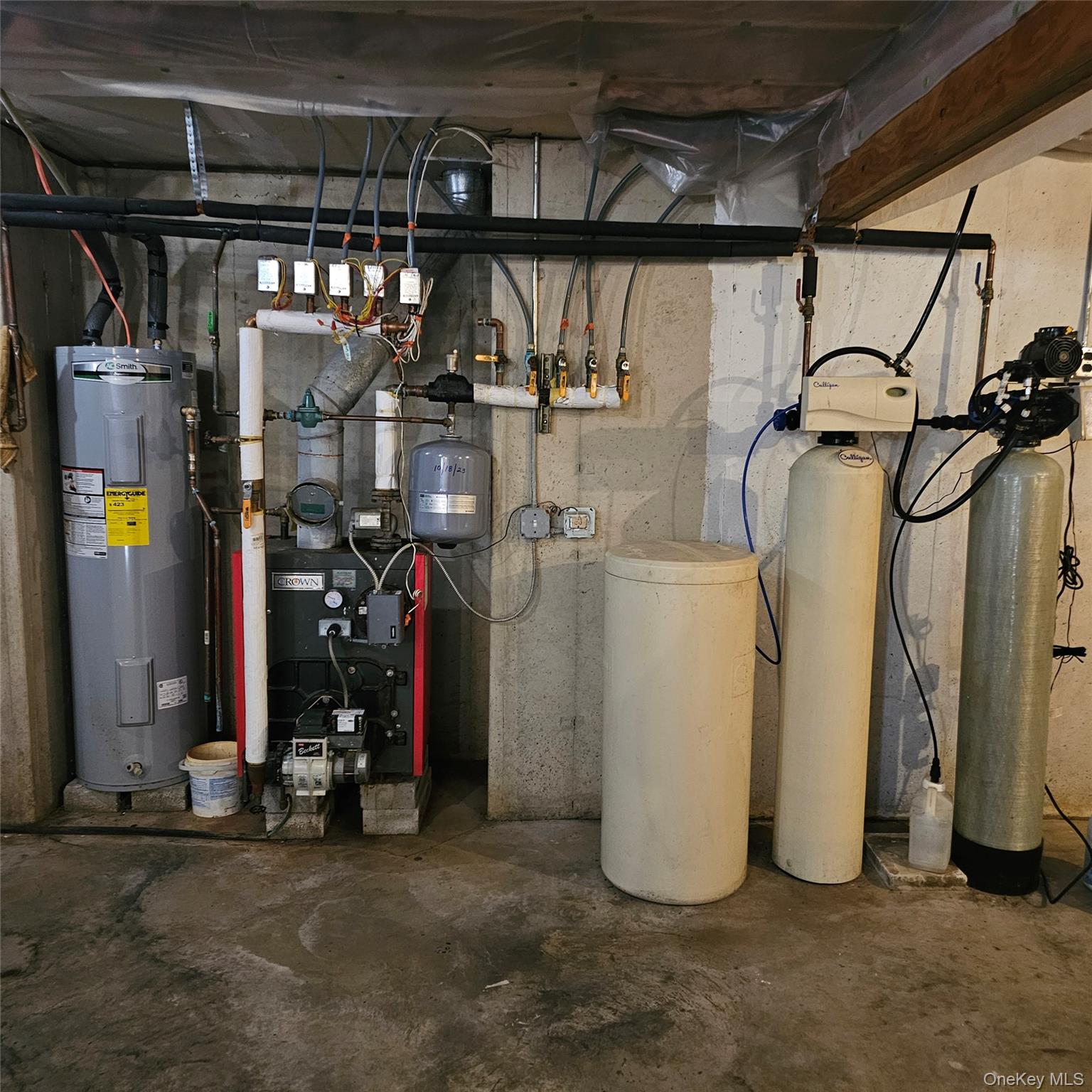 235 Maples Road Middletown, NY 10940 - Photo 28 of 34 Utility room featuring electric water heater and a heating unit