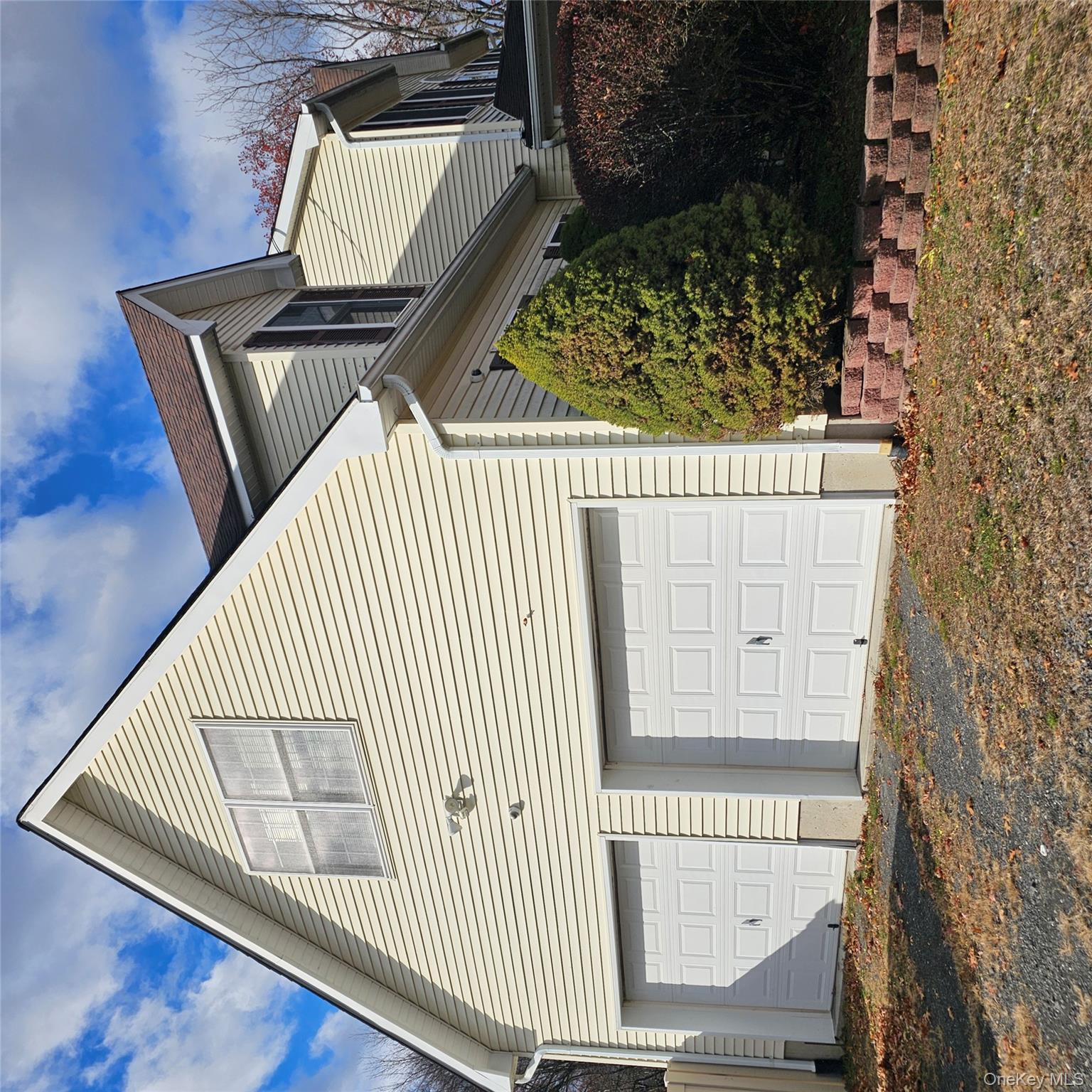 235 Maples Road Middletown, NY 10940 - Photo 3 of 34 View of home's exterior featuring a garage and driveway