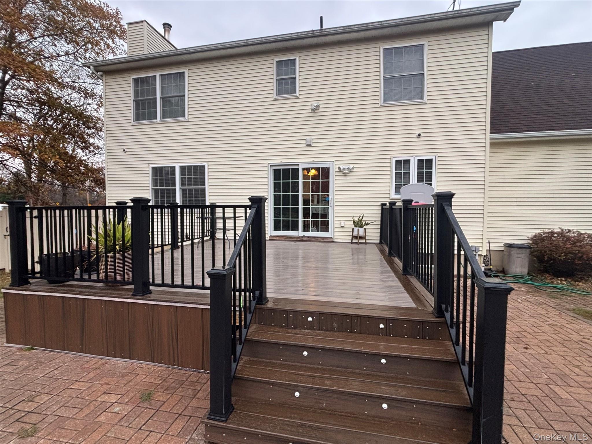 235 Maples Road Middletown, NY 10940 - Photo 32 of 34 Rear view of property featuring a deck and a chimney