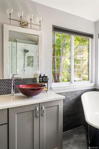 a bathroom with a sink and a bathtub