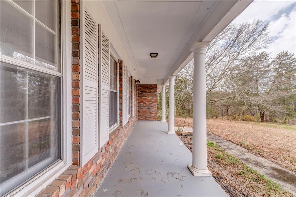 1065 Cartersville Street Ball Ground, GA 30107 - Photo 21 of 51 a view of a porch