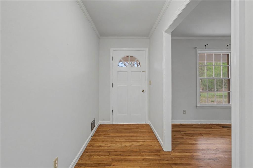 1065 Cartersville Street Ball Ground, GA 30107 - Photo 34 of 51 a view of an empty room