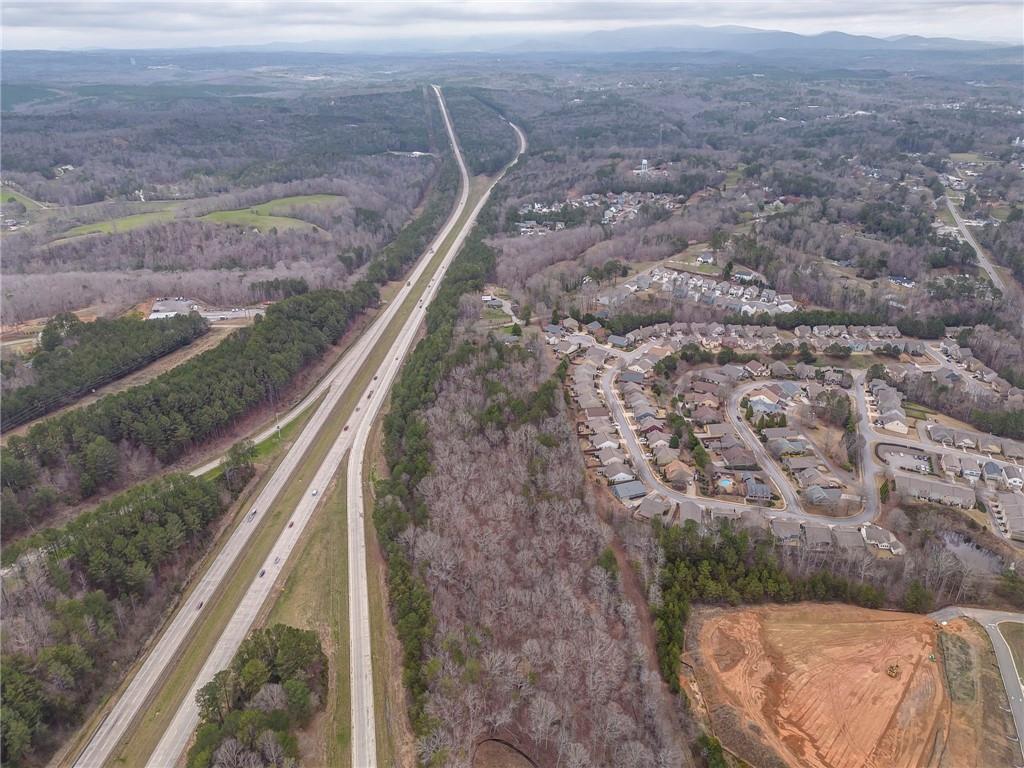 1065 Cartersville Street Ball Ground, GA 30107 - Photo 7 of 51 a view of a yard from a balcony