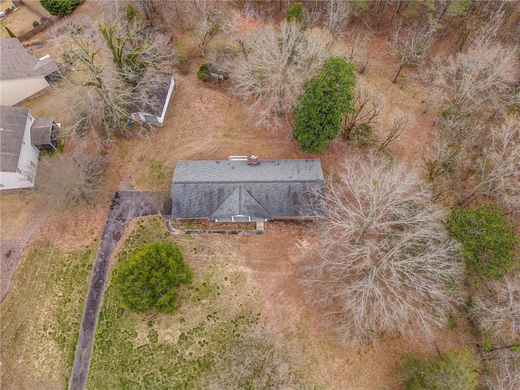 1065 Cartersville Street Ball Ground, GA 30107 - Photo 10 of 51 a view of a backyard of a house