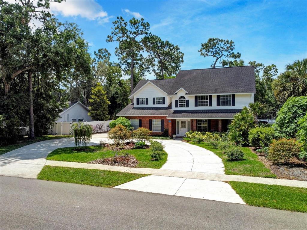 229 Main Road Lake Mary, FL 32746 - Photo 1 of 1 Front View 1. Showing one-of-a-kind style and circular drive.