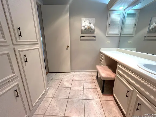 a view of a bathroom with a toilet