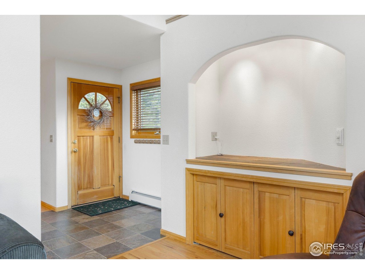 1117 Rock Lake Road Ward, CO 80481 - Photo 12 of 40 a view of an entryway with wooden floor
