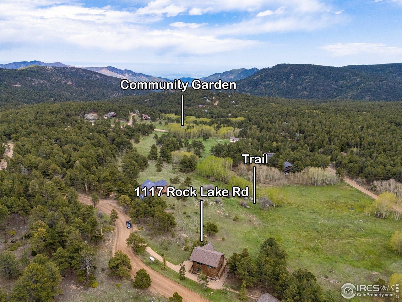1117 Rock Lake Road Ward, CO 80481 - Photo 40 of 40 a view of a lake with a mountain in the background