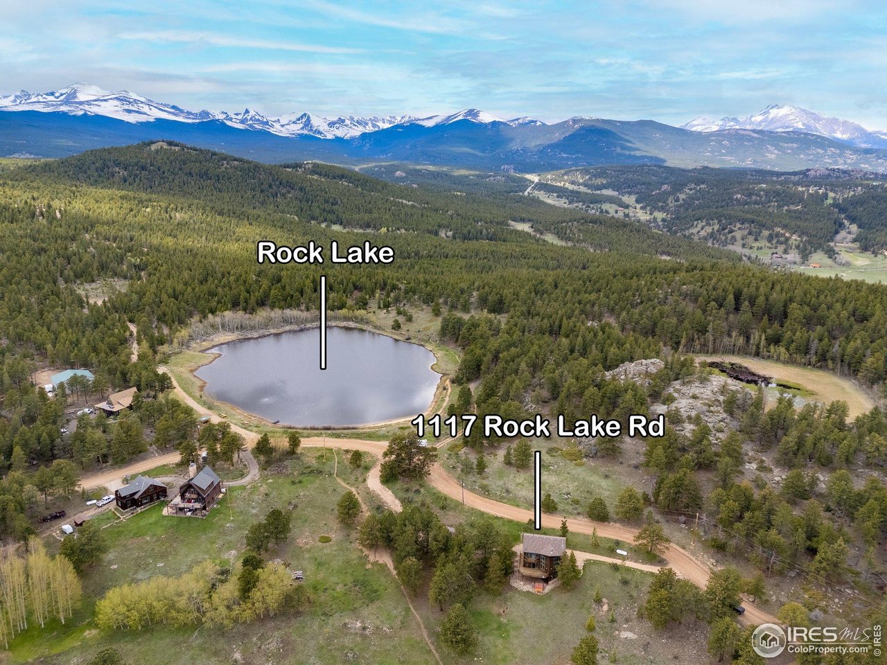 1117 Rock Lake Road Ward, CO 80481 - Photo 4 of 40 a view of a city with sunset