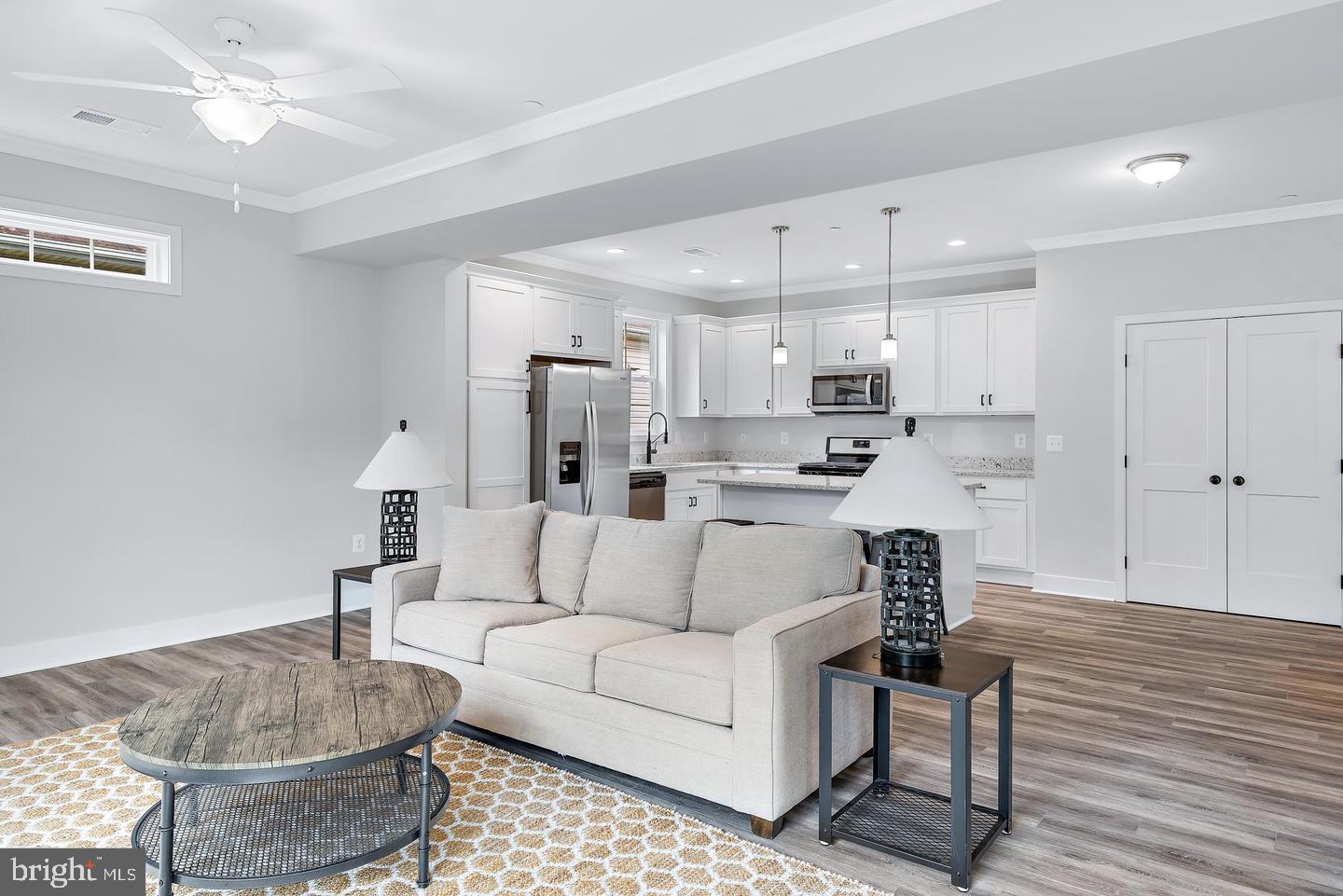 404 Paradise Road Riva, MD 21140 - Photo 14 of 51 a living room with furniture and a chandelier
