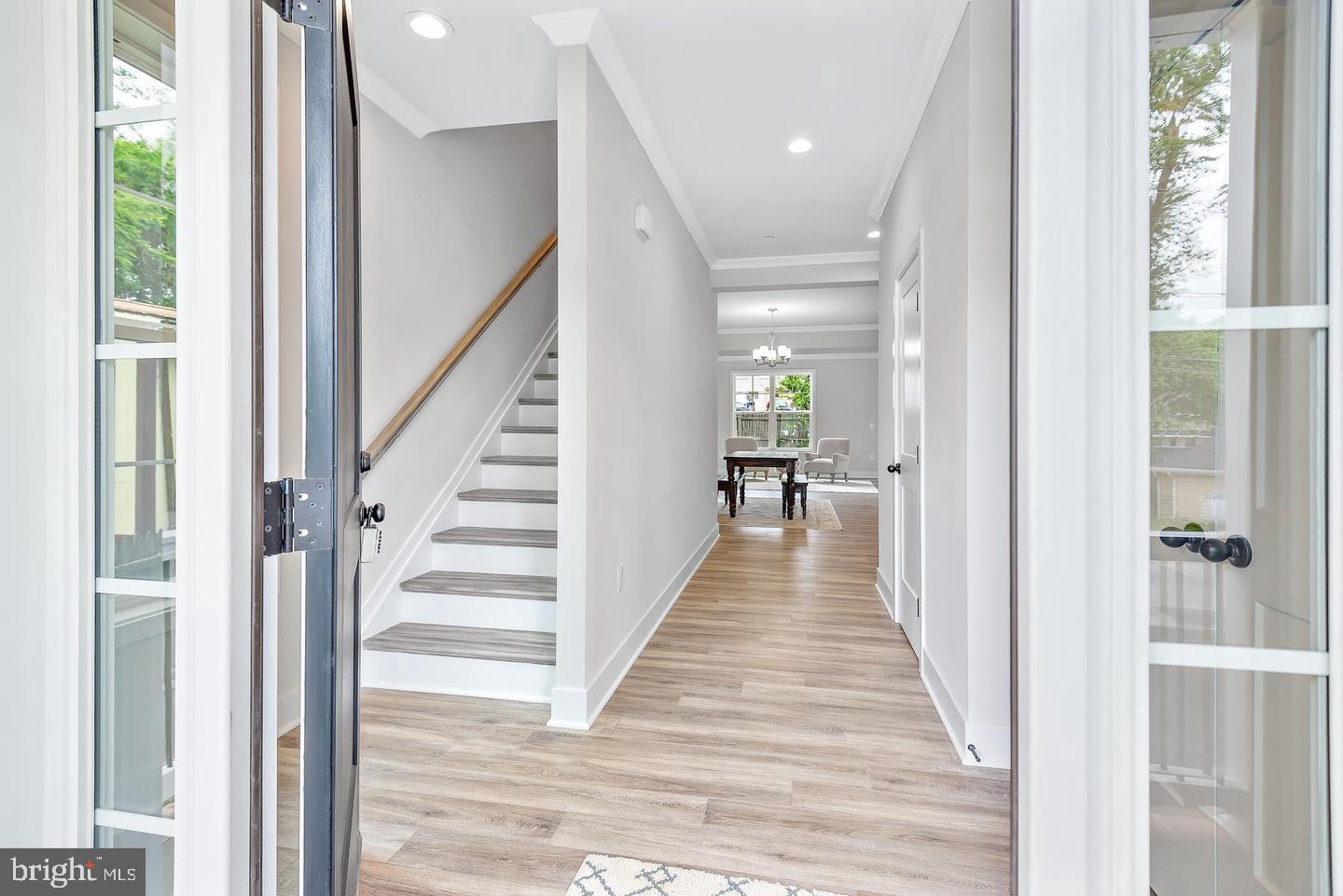 404 Paradise Road Riva, MD 21140 - Photo 2 of 51 a view of a hallway with the wooden floor and staircase