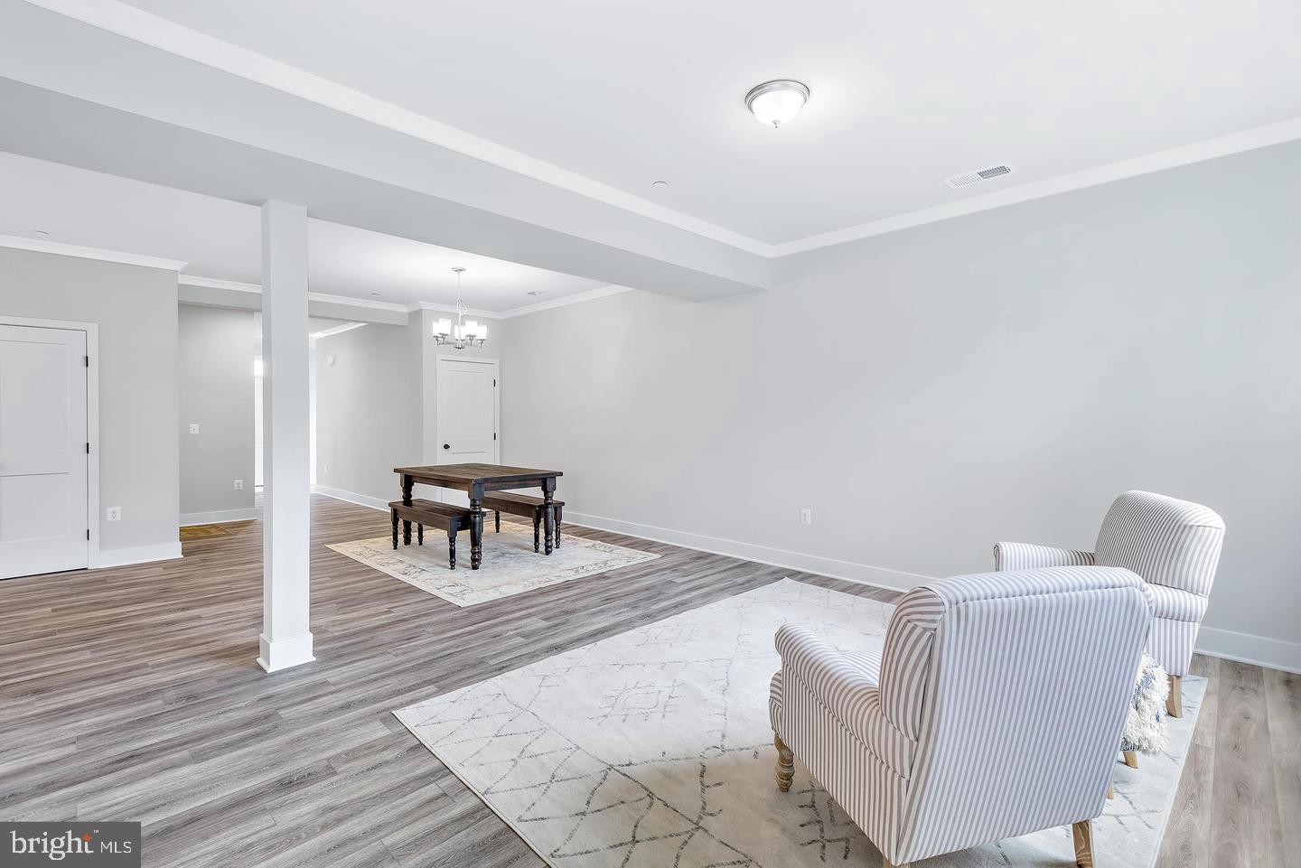 404 Paradise Road Riva, MD 21140 - Photo 21 of 51 a living room with furniture and a wooden floor