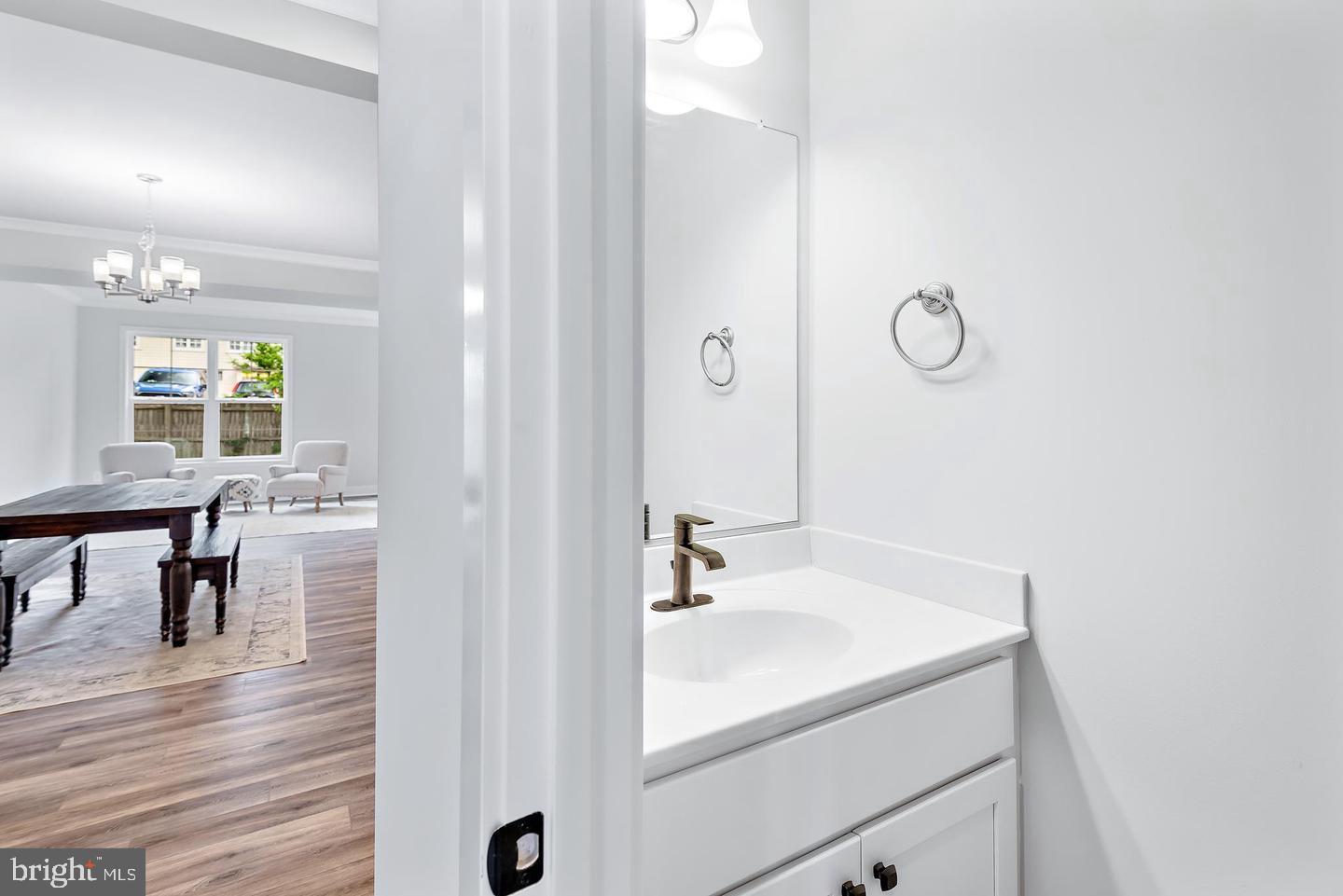 404 Paradise Road Riva, MD 21140 - Photo 22 of 51 a bathroom with a sink and a mirror