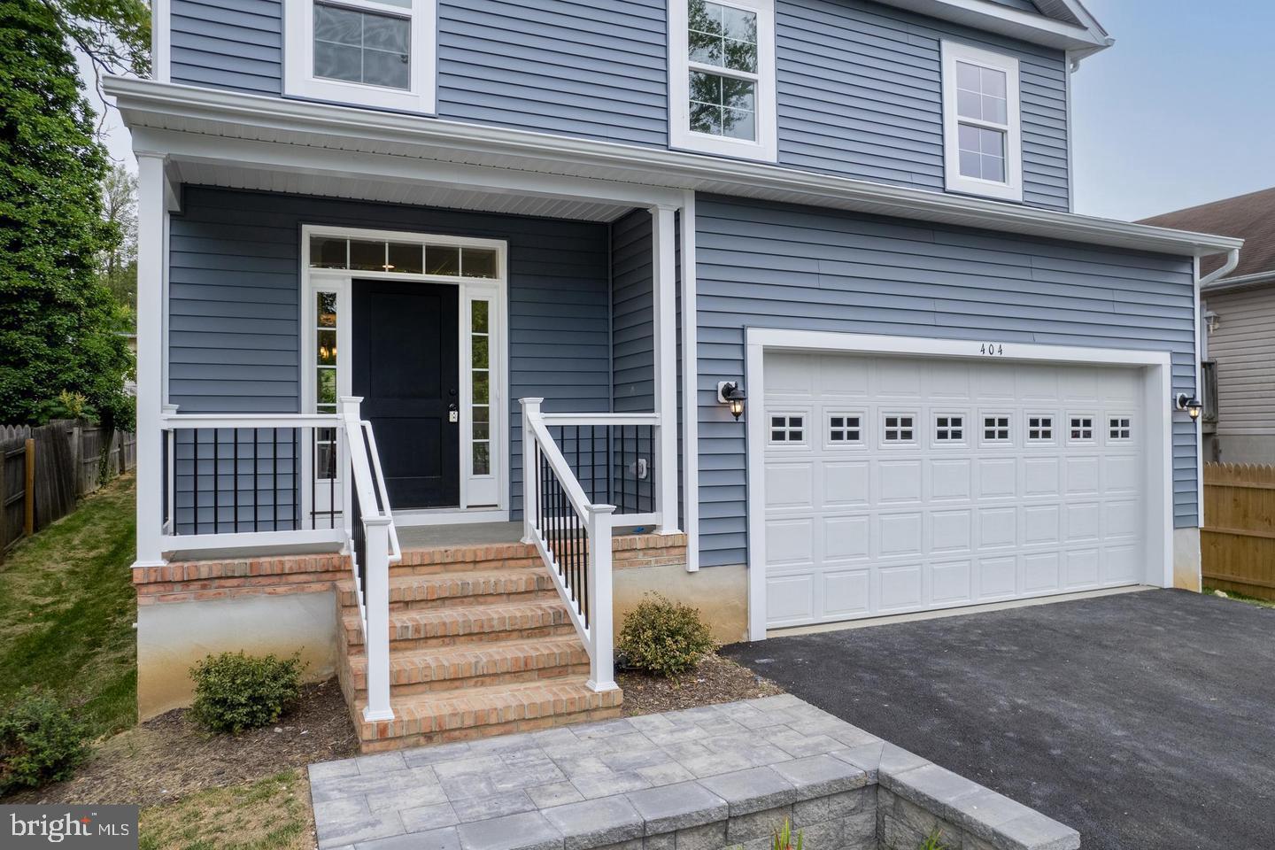 404 Paradise Road Riva, MD 21140 - Photo 3 of 51 a front view of a house with a yard