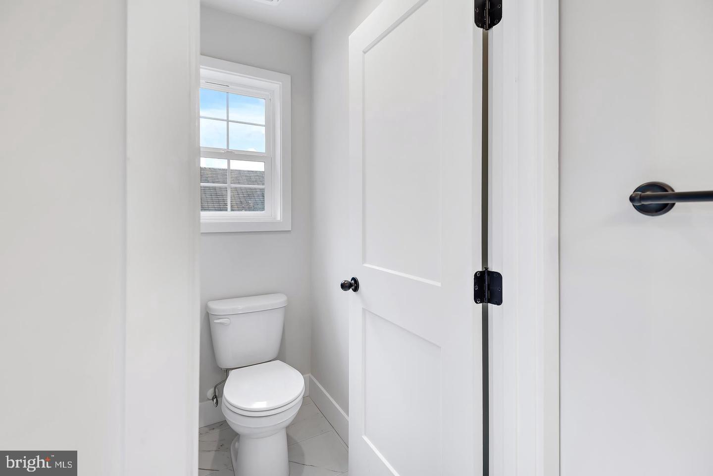 404 Paradise Road Riva, MD 21140 - Photo 31 of 51 a a bathroom with a toilet and a sink